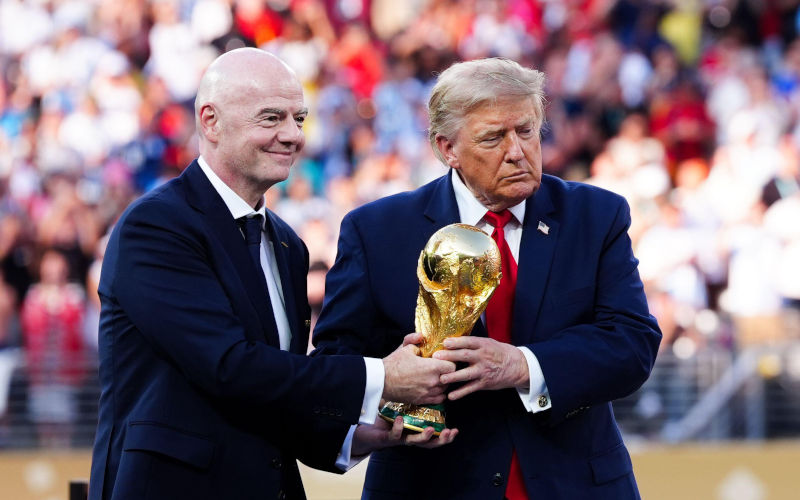 President Donald Trump and FIFA President Gianni Infantino present the FIFA World Cup Trophy following the FIFA World Cup 2026 final at the New YorkNew Jersey Stadium. July 19, 2026. Image Alamy Bradley Collyer PA images