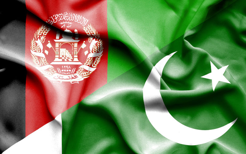 Waving flags of Pakistan and Afghanistan. Image iStock alexis84