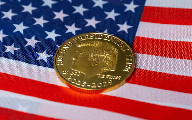 Crypto coins on American flag Image Alamy Oksana Tkachuk Alamy image ID 3CC6KK5
