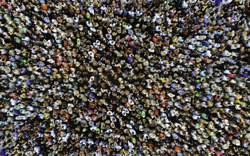 Big crowd of people. People gathered together in one place. Top view from drone. ImageiStock Dmytro Varavin