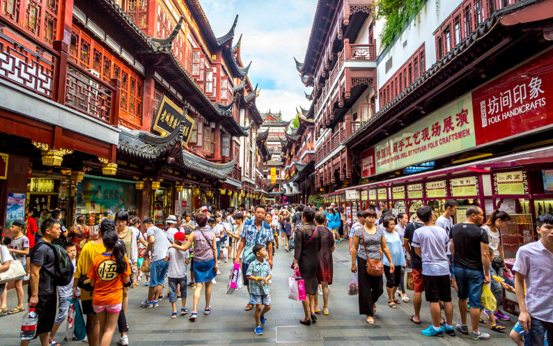 Chinese people shopping in a traditional Shanghai street. Image IStock leonardospencer