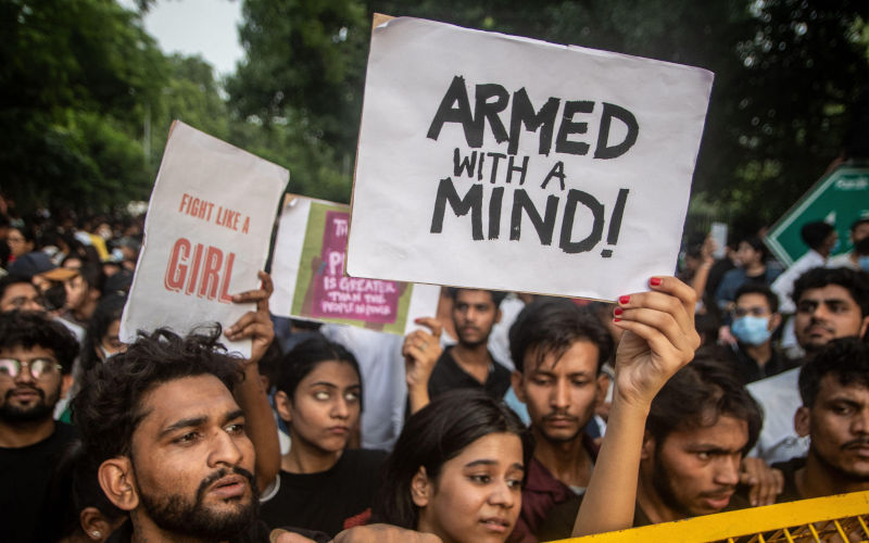 New Delhi, India. 25th July, 2026. NEW DELHI, INDIA JULY 25, 2026 Student protesters celebrate at Jantar Mantar following the resignation of Indias Union Education Minister Dharmendra Pradhan, in New Delhi, India. Demonstrators hold placards reading Jeet (Victory), wave the Indian national flag and climb police barricades after the announcement, following days of nationwide protests over alleged irregularities in the countrys education system. Image Amit Shukla JNA PRESS. Credit Sipa USA Alamy Live News Image ID 3F3WYH5