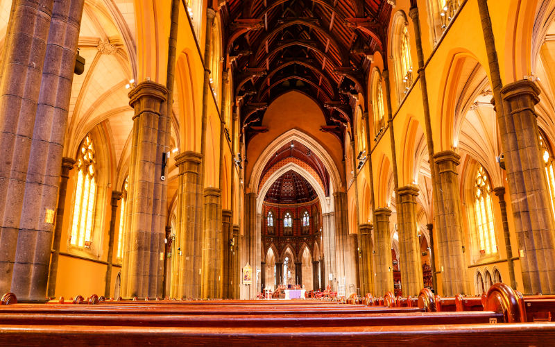 The main nave of St Patrick Catholic Cathedral, consecrated in 1897 and built in Gothic Revival architectural style, in Melbourne, Victoria, Australia. Image iStock ribeiroantonio