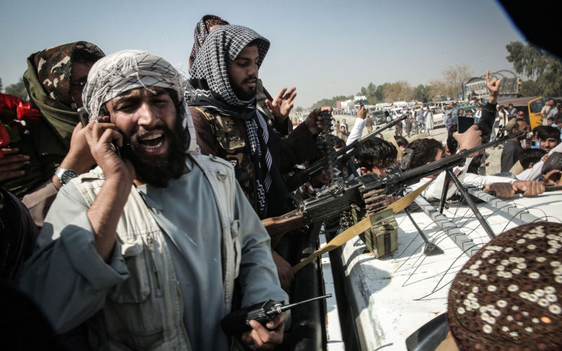Torkham, Afghanistan. 28th Feb, 2026. Taliban fighters ride on an armoured vehicle at a checkpoint near Torkham border crossing between Pakistan and Afghanistan. Credit Sami Jan dpa Alamy Live News Image ID 3DWTH48