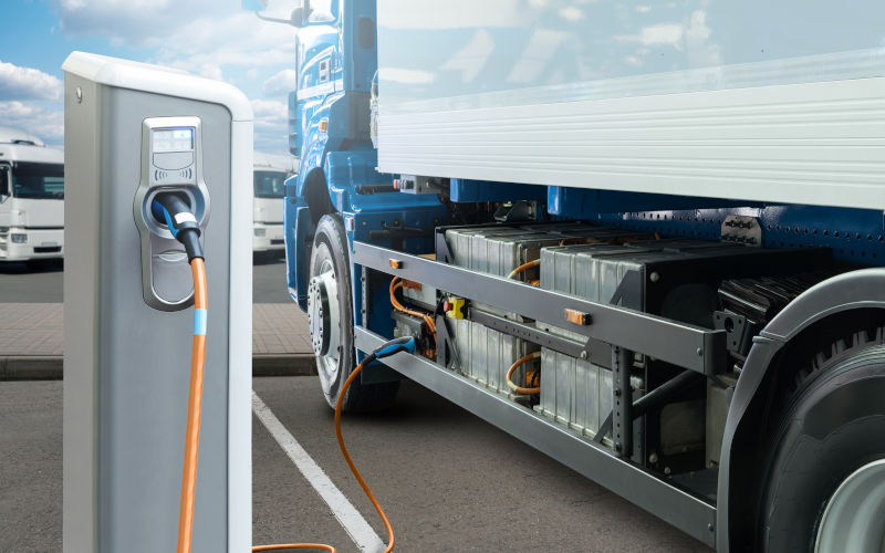Electric truck batteries are charged from the charging station. Image iStock charfsinn86