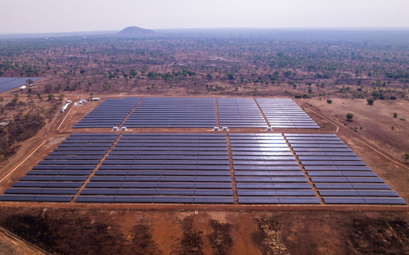 Renewable Energy, Drone Shot of African solar power plant in arid landscape in Ghana. Image iStock ROGER YEBUAH