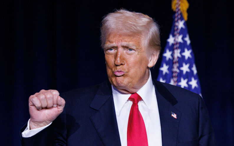 President Donald Trump gives a fist bump as he arrives at the National Prayer Breakfast in the Washington Hilton, in Washington DC, on Thursday, February 6th 2025. ImageAaron Schwartz Sipa USA Alamy image ID 2SCCDGC